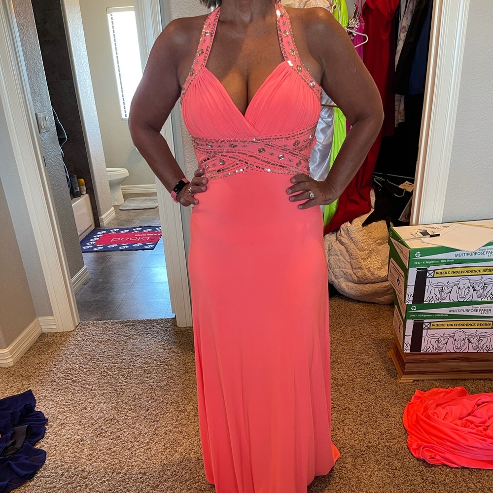Beautiful coral colored dress.